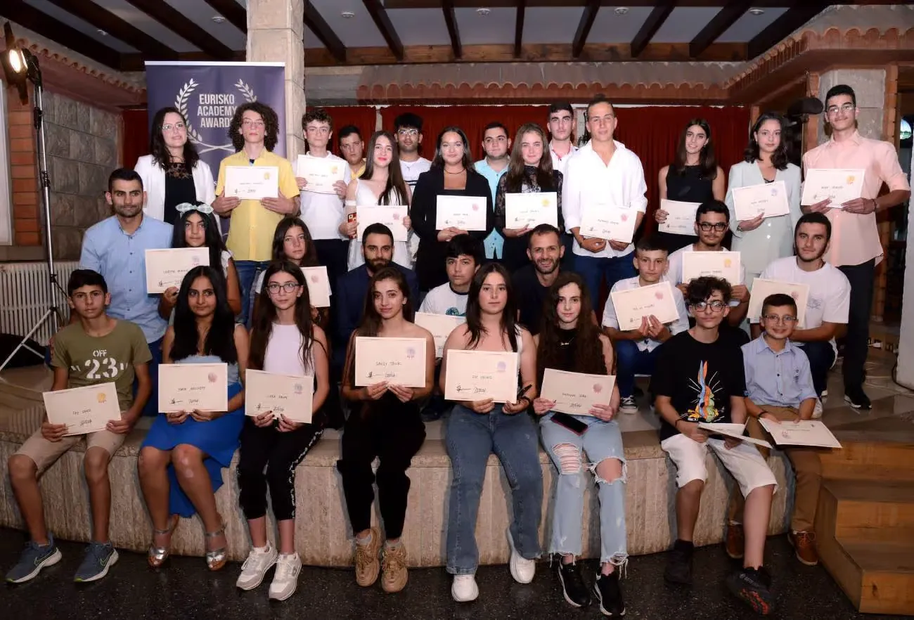 Ziad Tawk (CTO / Co-founder, on the left) & Edgard Tawk (CEO / Co-founder, on the right) with the 25 winners of the 1st Eurisko Schools Program Awards